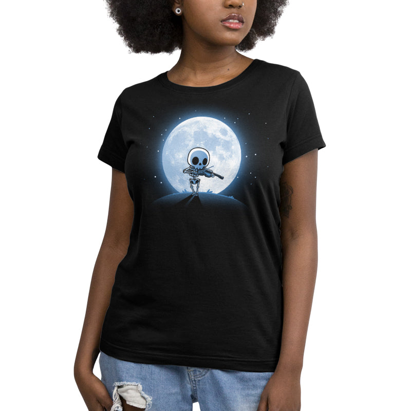 A woman wearing a black t-shirt with an image of Skulls and Soundwaves (Glow), featuring a TeeTurtle original design.