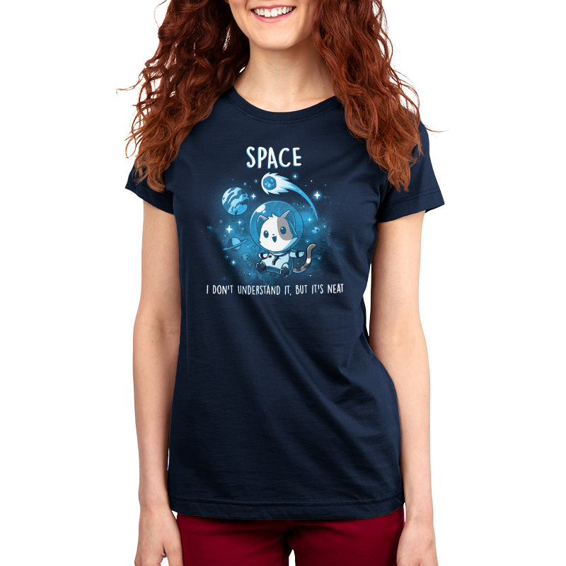 A woman wearing a Space is Neat t-shirt by TeeTurtle in a universe filled with floating rocks and glowing balls of hot gas.