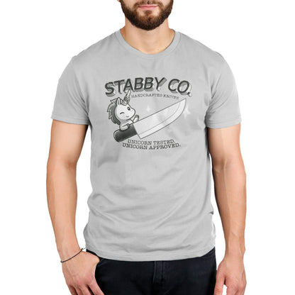 A man wearing a Stabby Co. Handcrafted Knives T-shirt with TeeTurtle's logo.