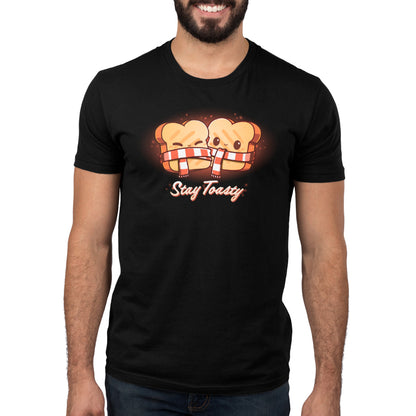 A man wearing a black T-shirt with the words "Stay Toasty" from TeeTurtle.