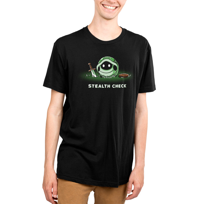 A young man in Stealth Check (Turtle) mode wearing a black t-shirt from TeeTurtle.