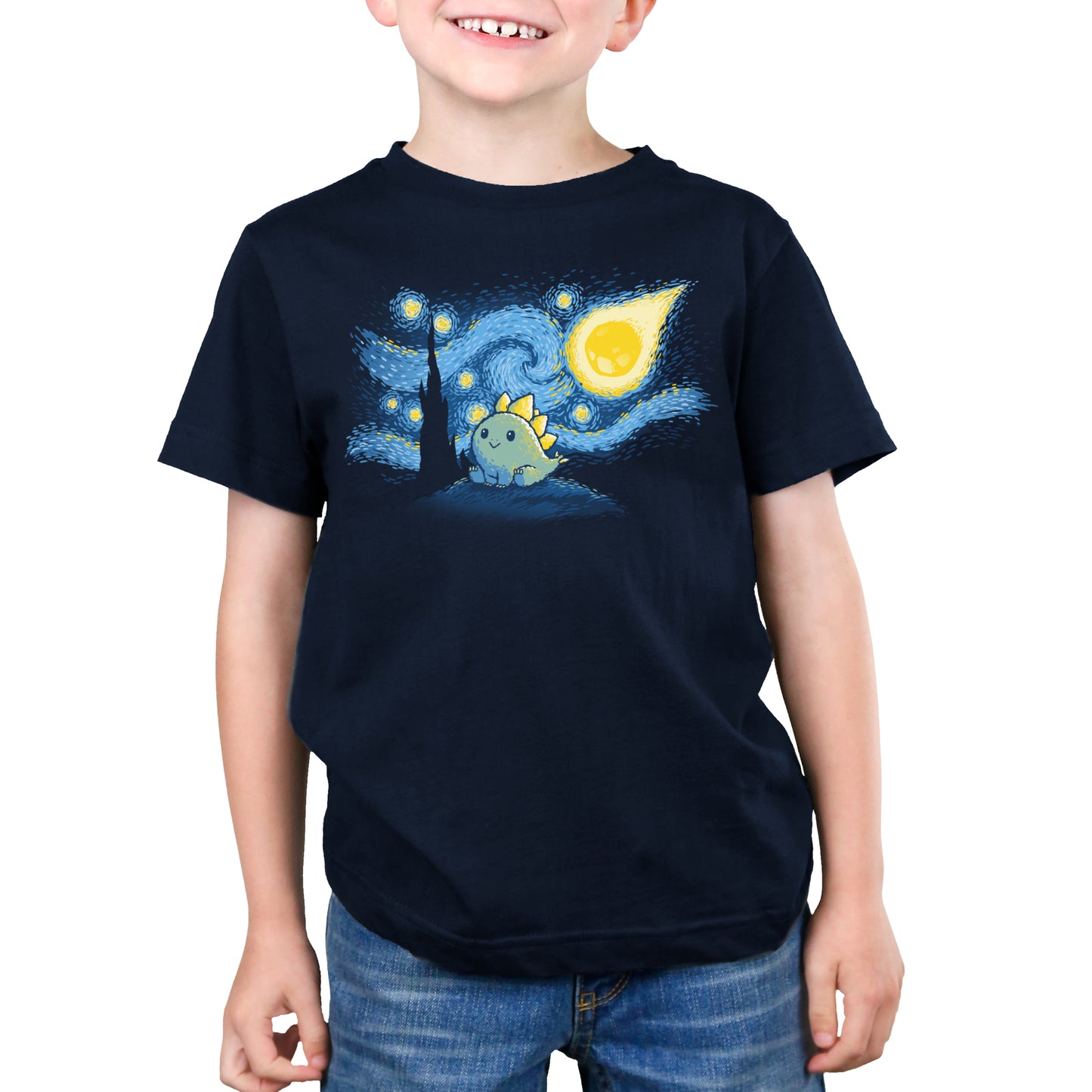A young boy wearing a navy blue t-shirt featuring the Stego Night design by TeeTurtle.