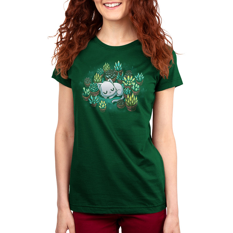 Premium Cotton T-shirt_TeeTurtle Succulent Garden Forrest Green t-shirt featuring an illustration of a white cat sleeping, surrounded by various green and yellow succulent plants in pots, set against a dark green background. 