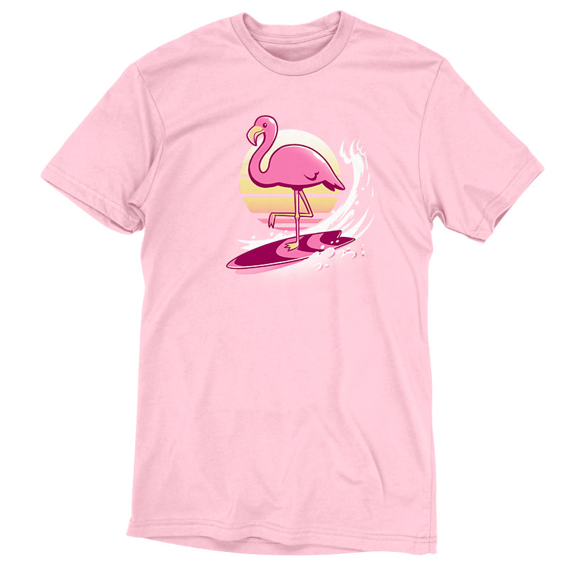 A Surfing Flamingo t-shirt featuring a pink flamingo surfing from TeeTurtle.