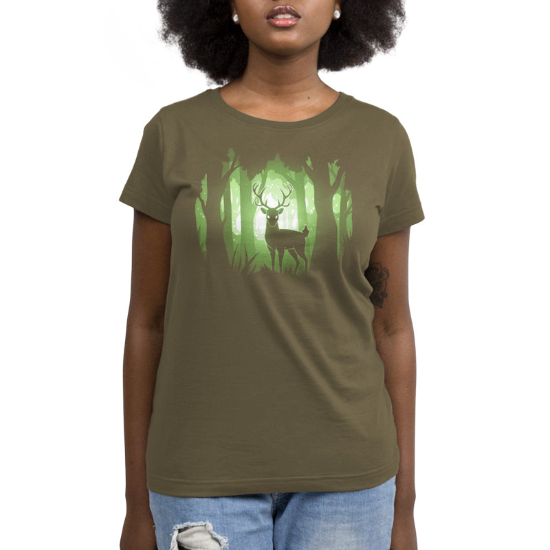 A woman wearing a TeeTurtle military green t-shirt in the Tranquil Forest.