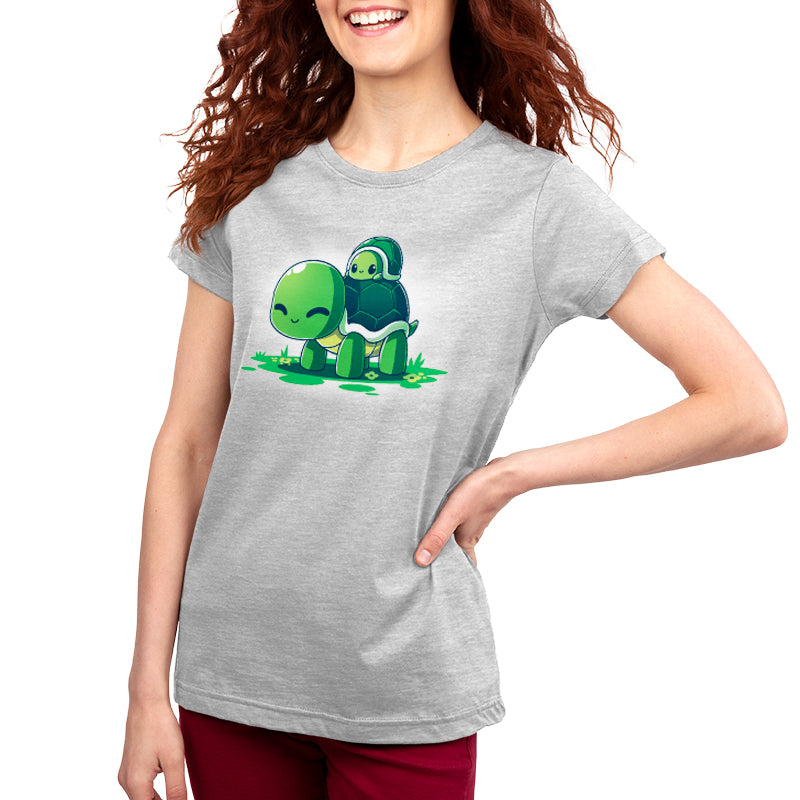 A comfortable women's Turtleback Ride t-shirt made of ringspun cotton, featuring a green turtle design by TeeTurtle.