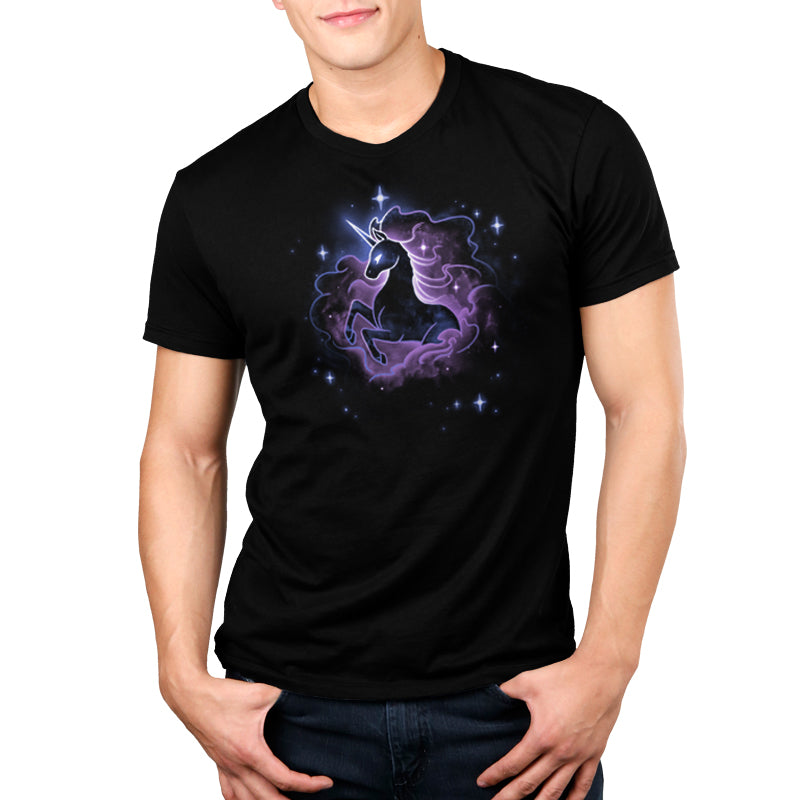 A man wearing a black t-shirt with an image of a unicorn from the TeeTurtle Unicorn Nebula.