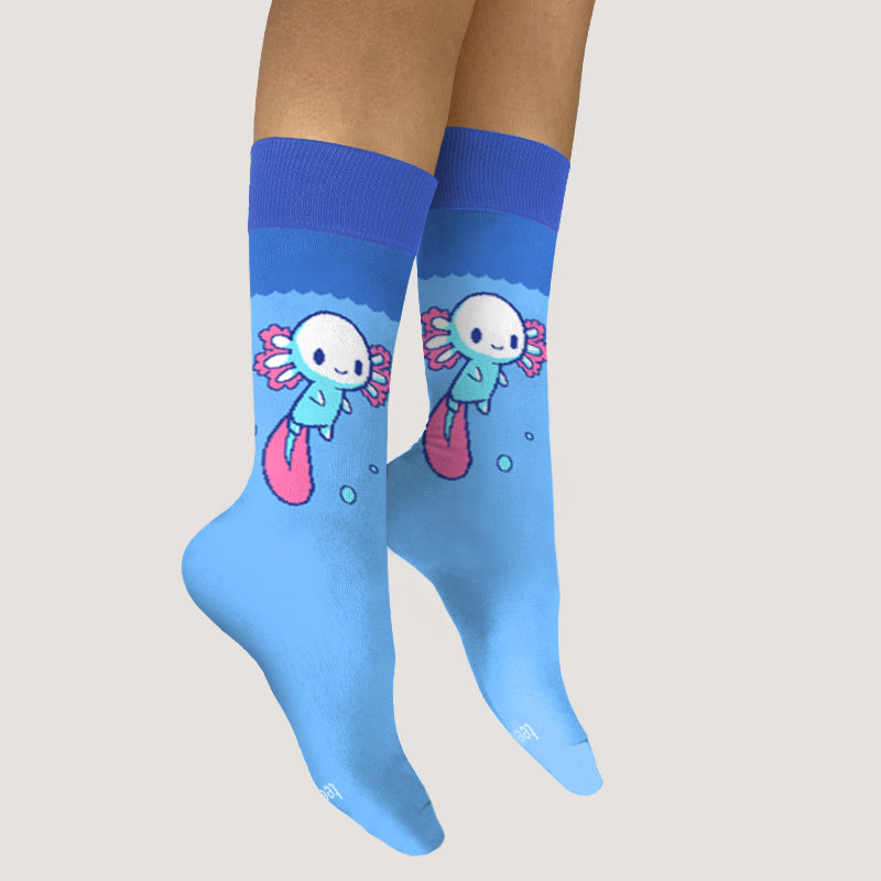 A pair of Axolotl Socks with a mermaid on them that are comfortable and fit well by TeeTurtle.