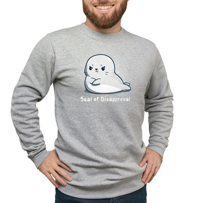 A man wearing a charcoal gray sweatshirt with the TeeTurtle Seal of Disapproval on it.