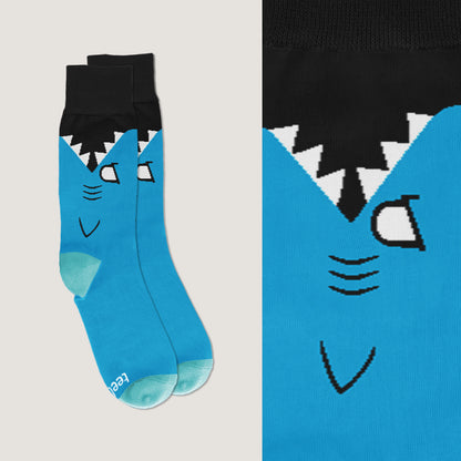 A pair of TeeTurtle Shark Bite Socks, that are both comfortable and one size fits all, featuring a shark face design.