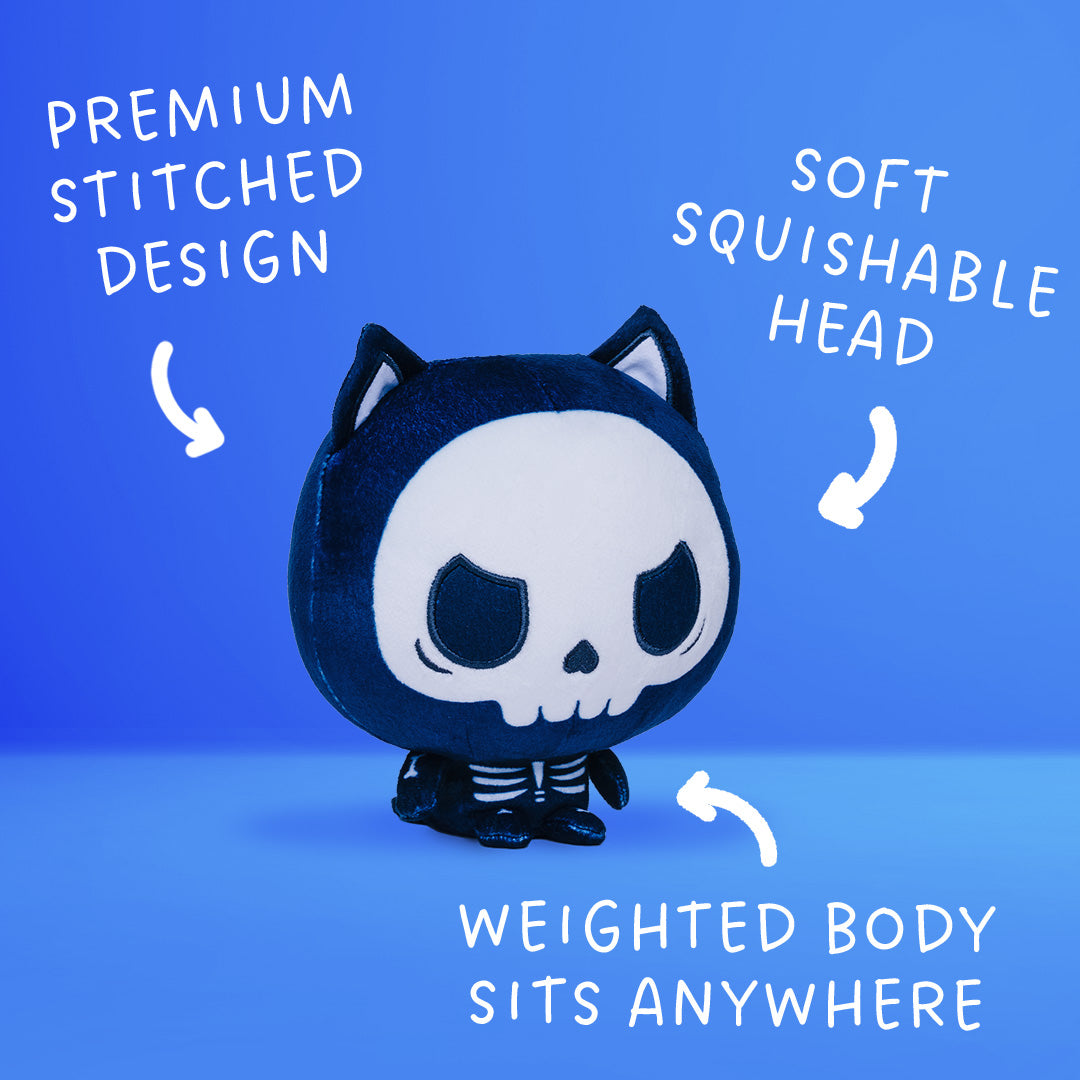 Cloudheads: 5" Skeleton Cat (Skelly) is a cat skeleton Cloudheads plushie. The skull face has a grumpy look to it. It's turned to the side and has text that says "premium stitched design," "soft squishable head," and "weighted body sits anywhere" with arrows pointing to the plushie. 