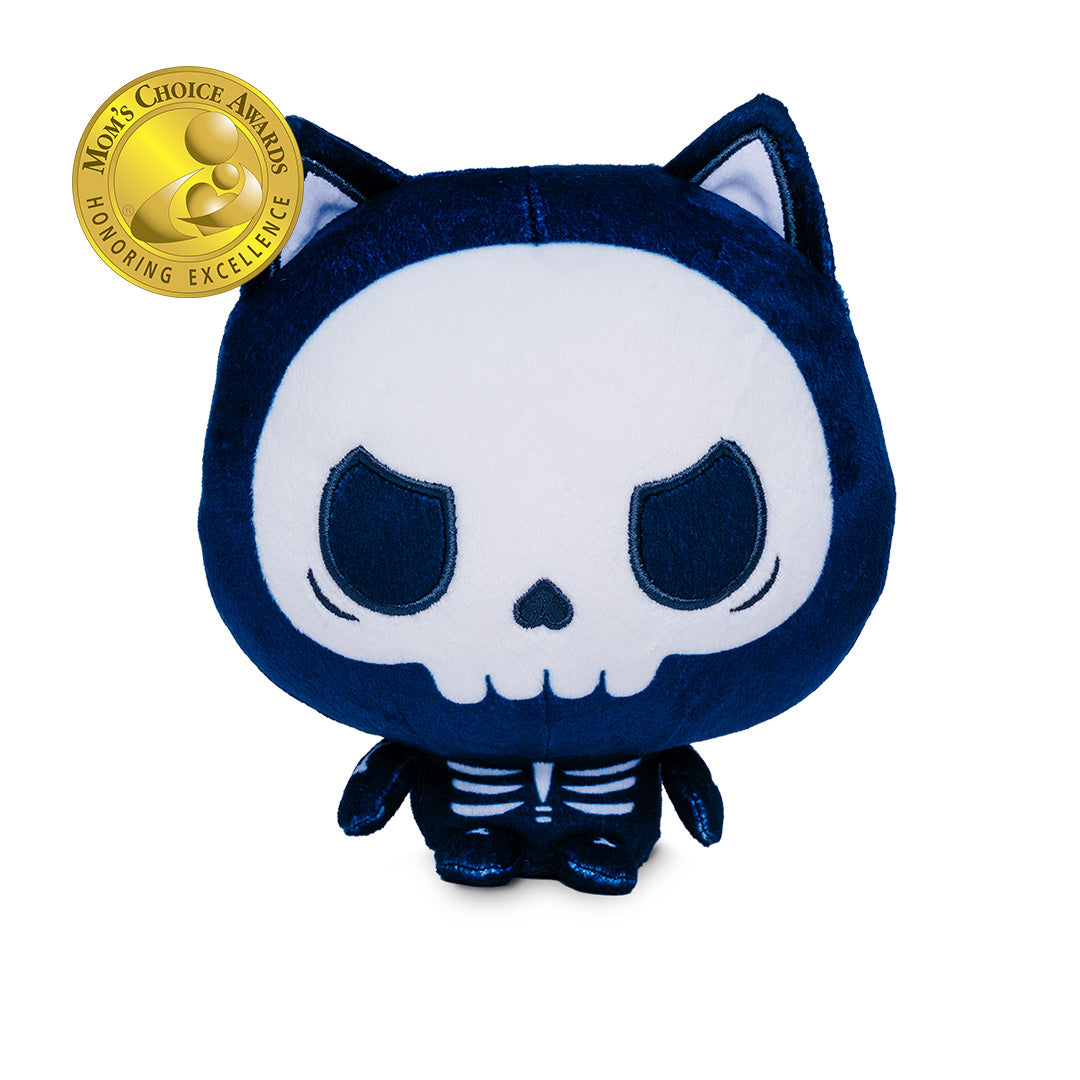 Cloudheads: 5" Skeleton Cat (Skelly) is a cat skeleton Cloudheads plushie. The skull face has a grumpy look to it. There's a Mom's Choice Awards seal on the upper left corner. 