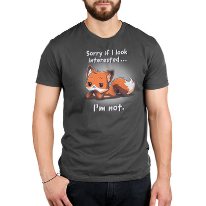 Sorry if I look interested, I'm not TeeTurtle's "Sorry If I Look Interested... I'm Not" charcoal gray t-shirt.