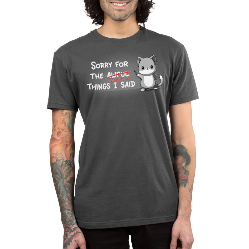 A man wearing a charcoal gray t-shirt that says Sorry For the Accurate Things I Said men's t-shirt by TeeTurtle.