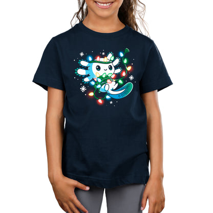 A girl wearing a Tangled Up Axolotl t-shirt by TeeTurtle, with a Christmas tree on it.