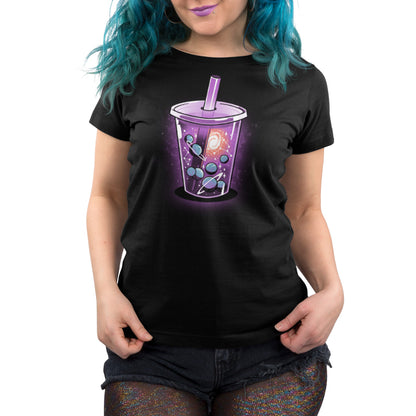 A woman wearing a black t-shirt with an image of a purple cup from TeeTurtle's Milk-Tea Way.