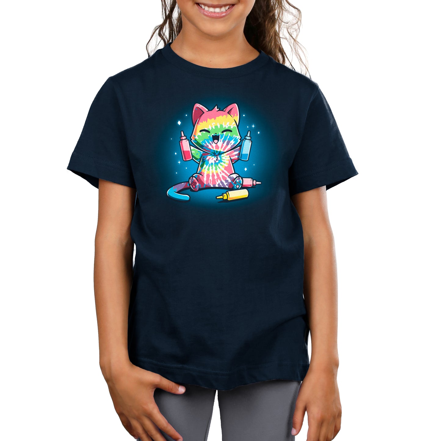 A girl wearing a TeeTurtle Tie-Dye Cat t-shirt.