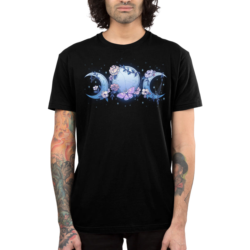 Premium Cotton T-shirt_TeeTurtle black Enchanted Moons featuring a full moon surrounded by crescent moons on each side with flowers, cobwebs, and a moth.