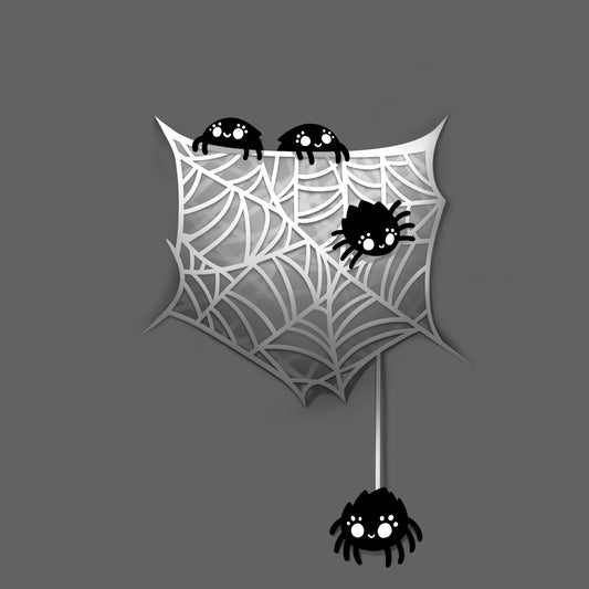 A black and white image of a spider in a Webbed Pocket on a TeeTurtle charcoal gray t-shirt.