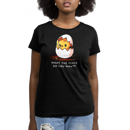 Premium Cotton T-shirt - A woman wearing a black unisex apparelwith a graphic of an angry chick breaking out of an eggshell and the text "What the Cluck Do You Want?" The super soft ringspun cotton monsterdigital What the Cluck Do You Want? apparel adds extra comfort to its bold statement.