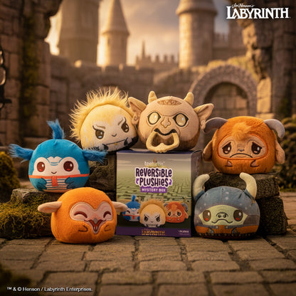 All Six Labyrinth Reversible Plushies with Mystery Box Packaging in front of a grand castle