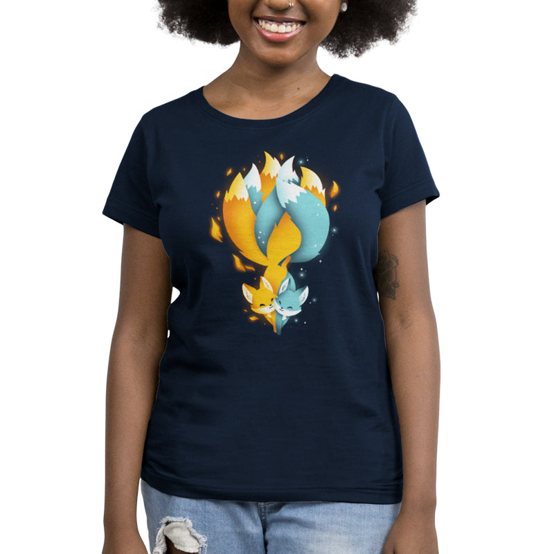 Premium Cotton T-shirt_TeeTurtle Tails of Fire and Ice navy blue t-shirt featuring an orange and blue kitsune with their tails interlocked with flames and ice sparkles surrounding them.