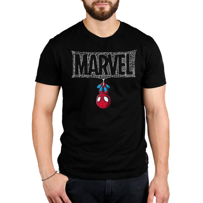 A man wearing an officially licensed Marvel "The Amazing Spider-Man" t-shirt.