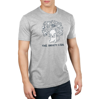 Premium Cotton T-shirt_Teeturtle silver gray The Anxiety is Real featuring an anxious white cat holding its head while imagining all the various things it's anxious about with the image set above the words "The Anxiety is Real".