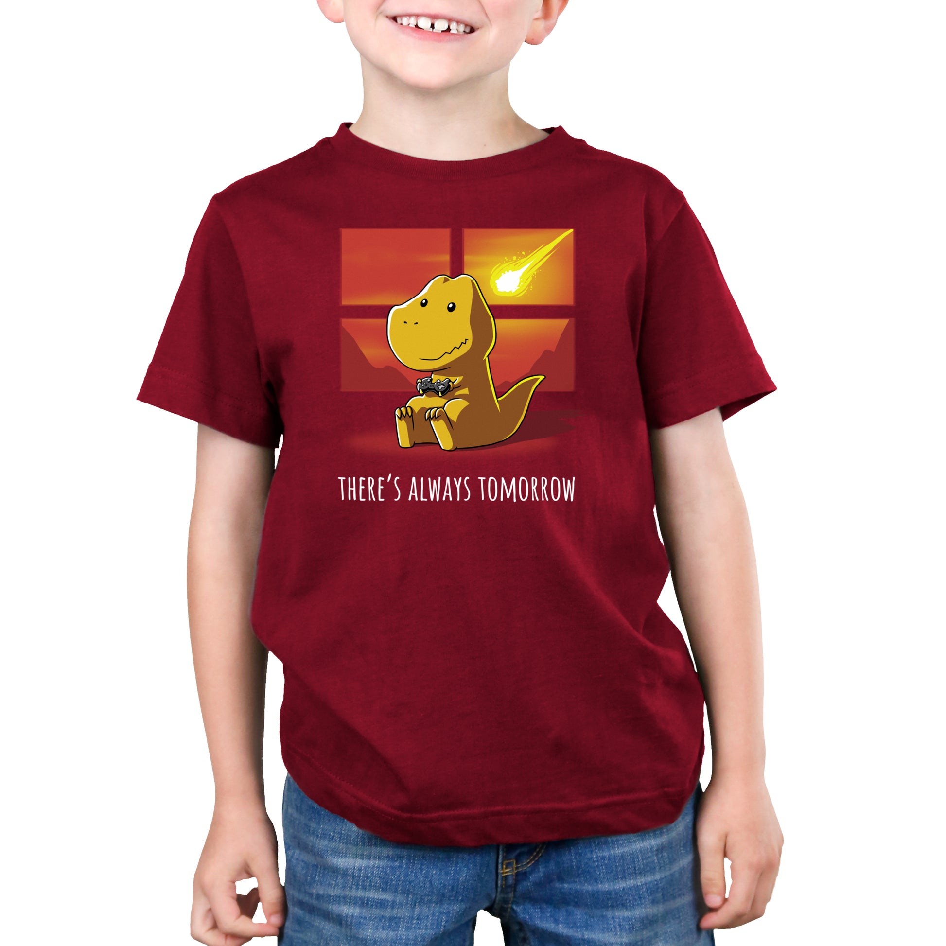 A young boy wearing a There's Always Tomorrow t-shirt made of TeeTurtle garnet red ringspun cotton.
