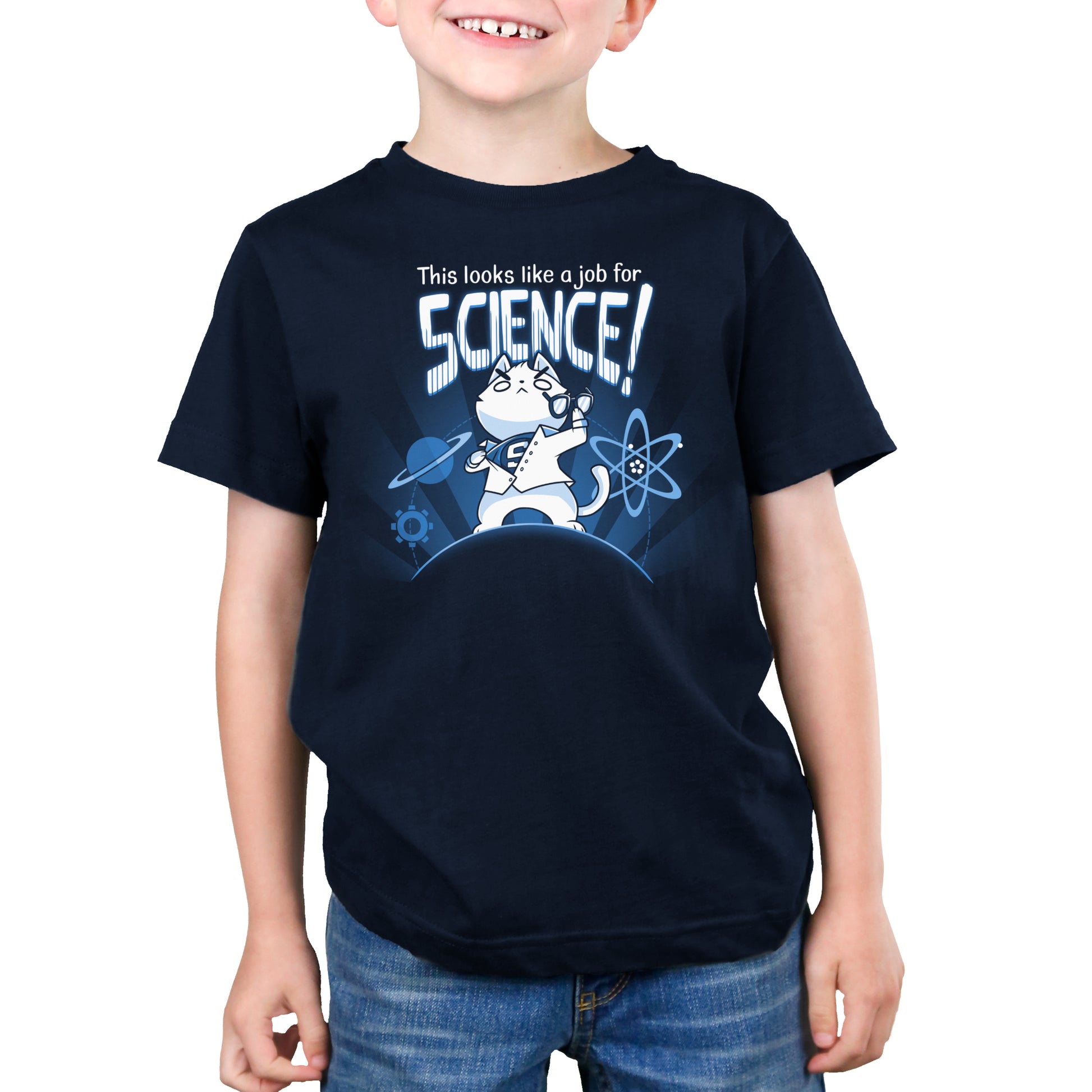 A young boy in a TeeTurtle "This Looks Like a Job for Science" t-shirt.