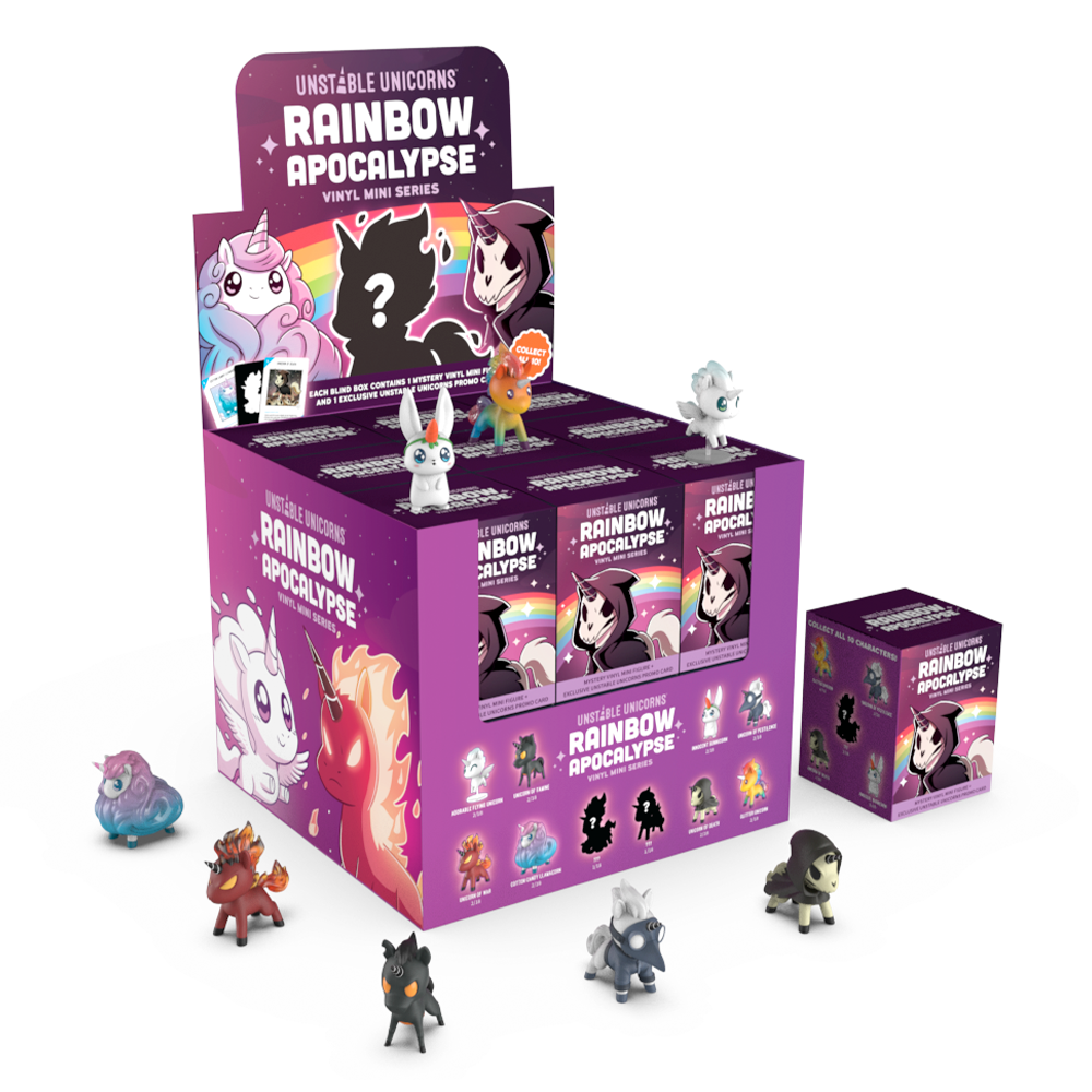 Artfully arranged around the vibrant Vinyl Figure Blind Box by Unstable Games, the display features "Unstable Unicorns: Rainbow Apocalypse" vinyl mini figures, including several unicorn and character figurines.