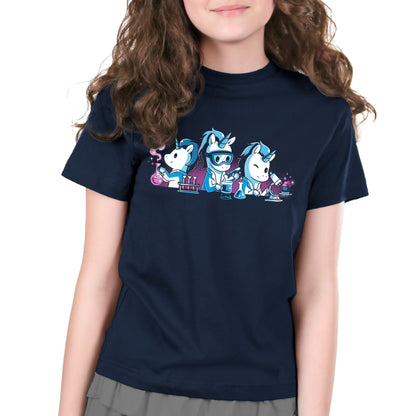 A girl wearing a super soft ringspun cotton navy blue tee featuring monsterdigital's Unicorn Scientists engaged in various scientific activities.