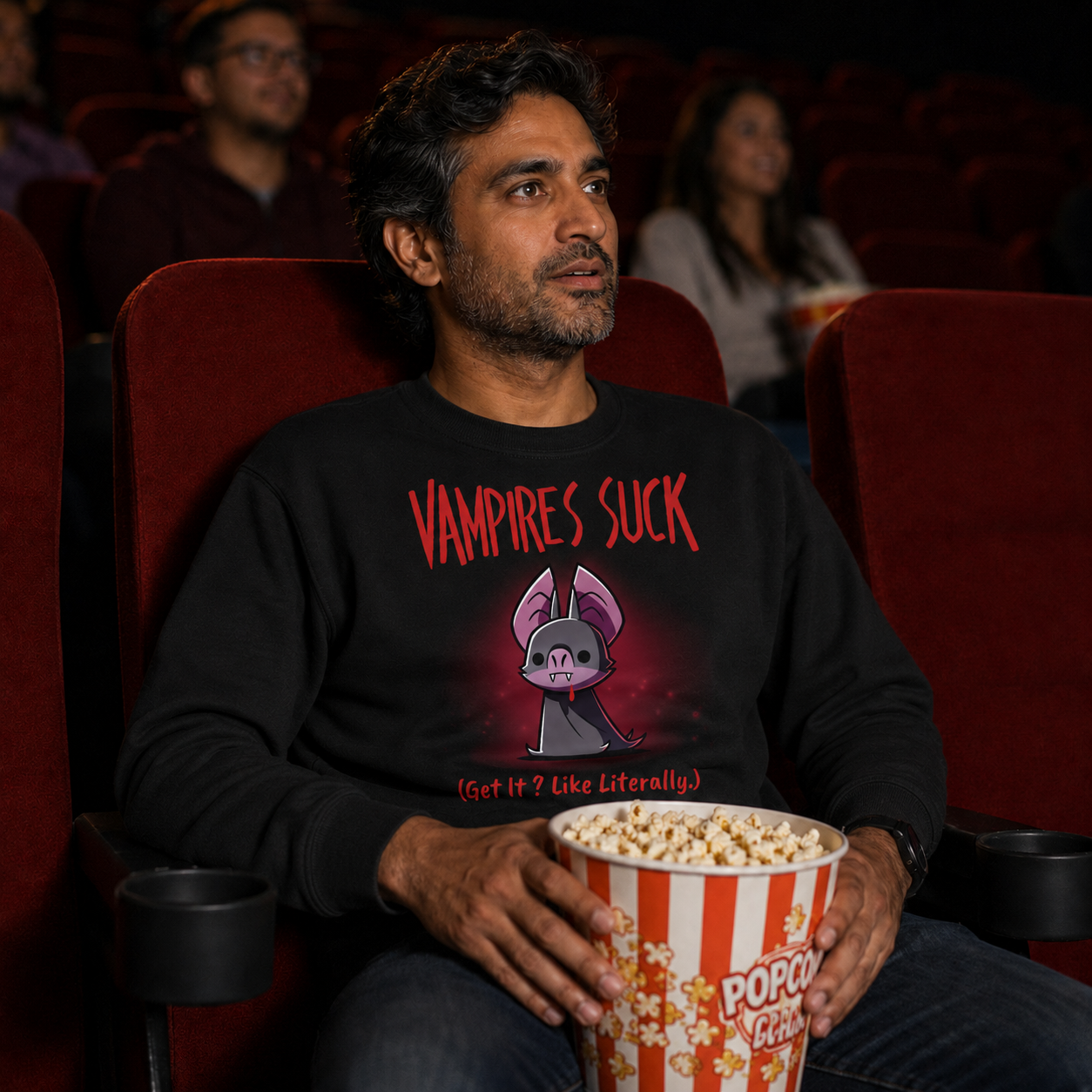 Crew Neck Sweatshirt_TeeTurtle black Vampires Suck Crew Neck Sweatshirt featuring a cute purple vampire bat with tiny fangs and a dark cape beneath the text "Vampires Suck" and the phrase "(Get It? Like Literally.)."