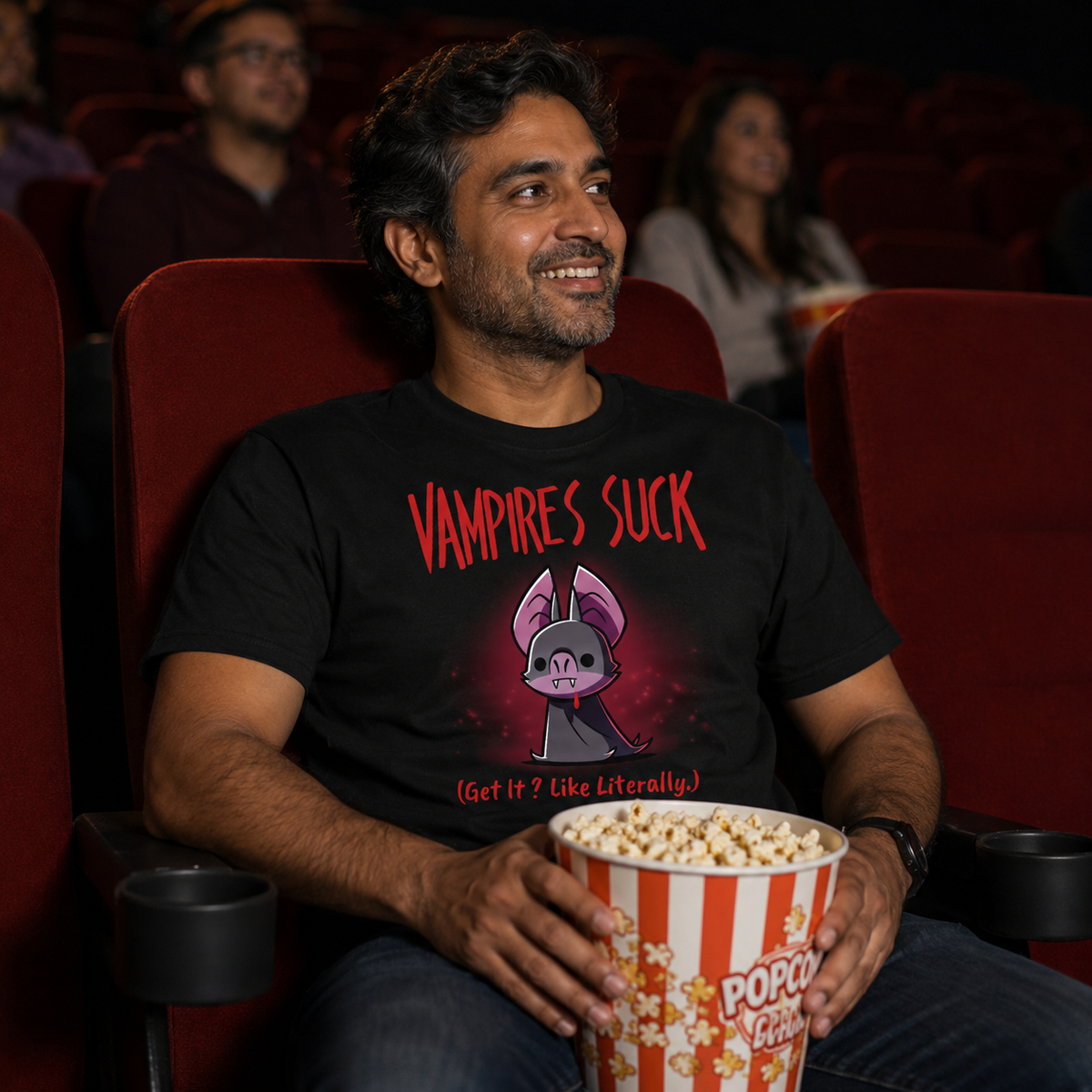 Men's Premium T-shirt_TeeTurtle black Vampires Suck Men's Premium T-shirt featuring a cute purple vampire bat with tiny fangs and a dark cape beneath the text "Vampires Suck" and the phrase "(Get It? Like Literally.)."