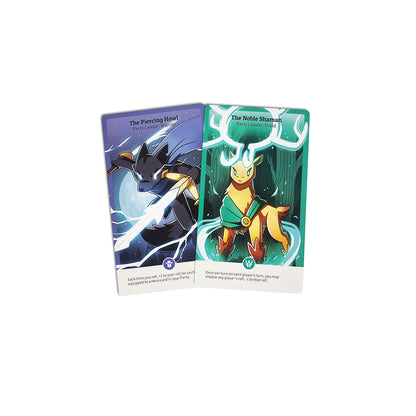 Two illustrated trading cards, titled "the piercing howl" and "the noble shaman," featuring artistic depictions of a wolf and a fox-like creature against themed backgrounds. These are part of the Here to Slay: Warriors & Druids Expansion by Unstable Games.