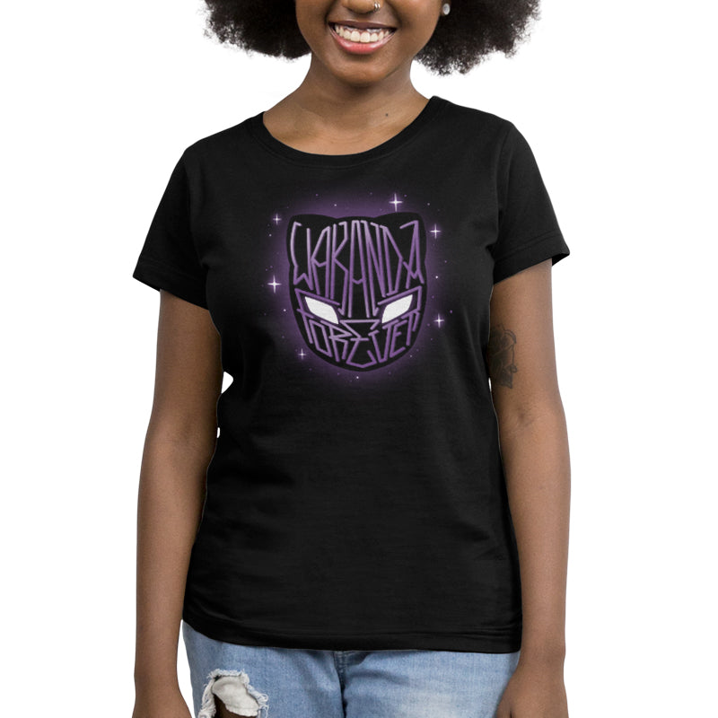 A woman wearing an officially licensed Marvel Wakanda Forever t-shirt.