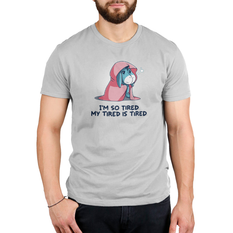 A man wearing an "I'm So Tired, My Tired is Tired" t-shirt by Winnie the Pooh.