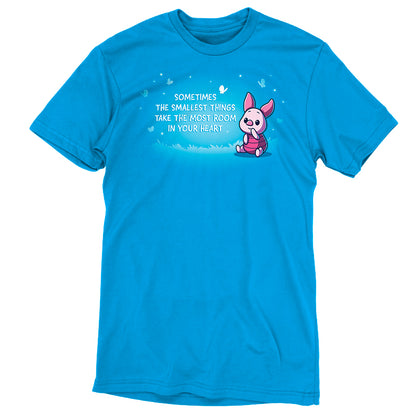 A Disney-themed blue t-shirt with an image of Piglet and the quote "Sometimes the Smallest Things Take Up the Most Room in Your Heart.