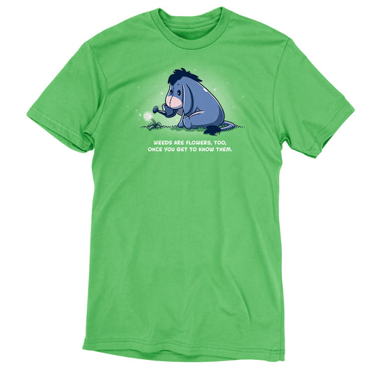 A green Weeds Are Flowers Too t-shirt with an image of an eagle and a quote, officially licensed by Disney.