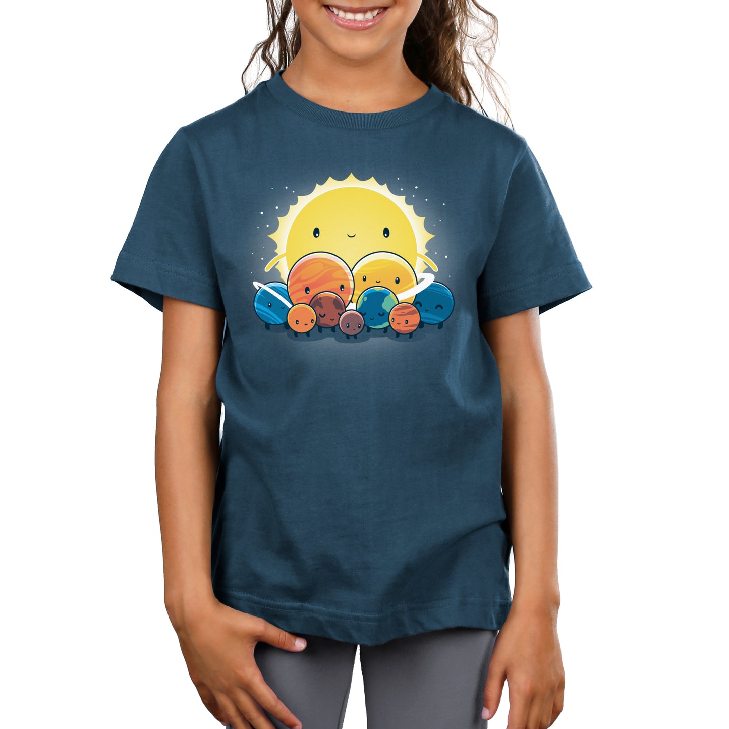 A girl wearing a blue T-shirt with a sun on it from TeeTurtle's We Still Love You, Pluto.