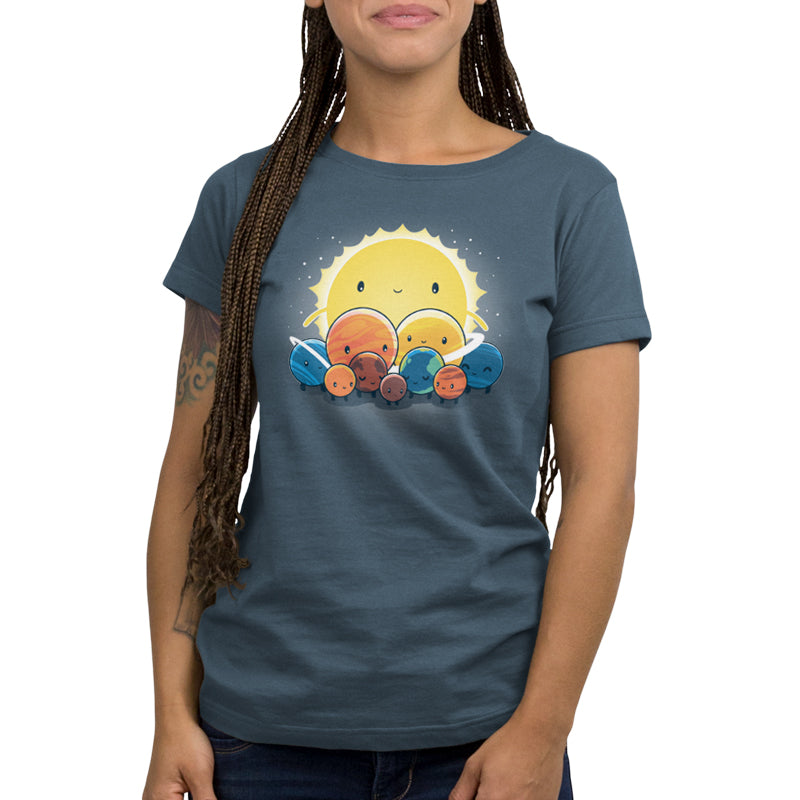 A denim blue We Still Love You, Pluto t-shirt featuring a sun and moon design from TeeTurtle.