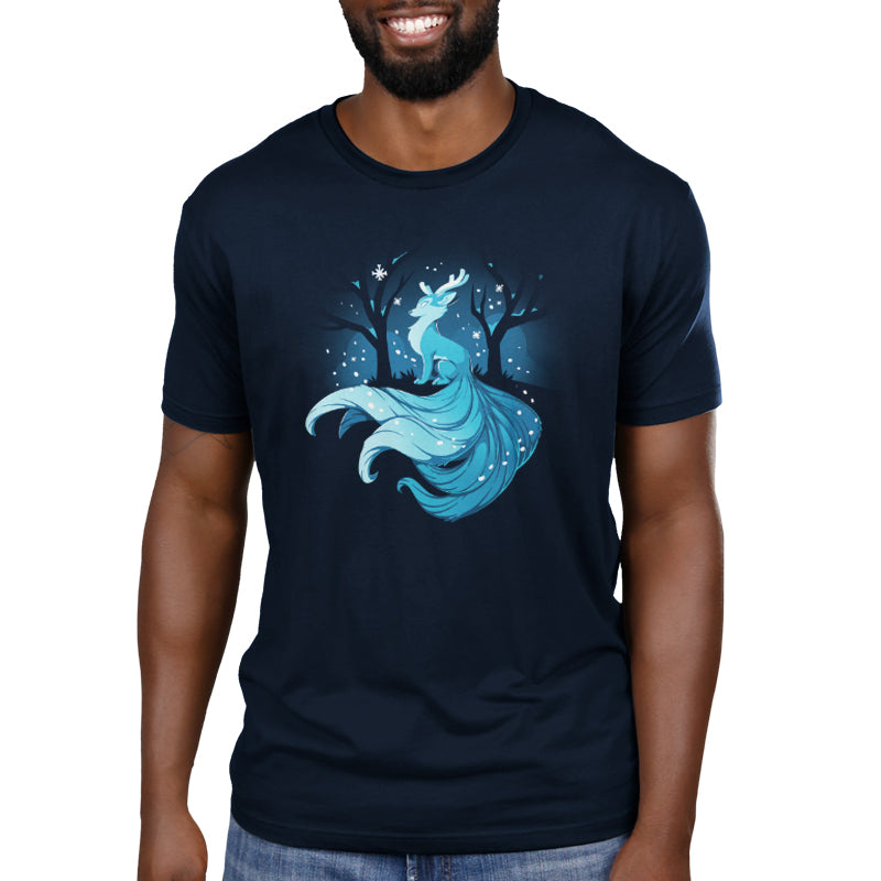 A man wearing a navy blue TeeTurtle Winter Kitsune t-shirt with an image of a fox.
