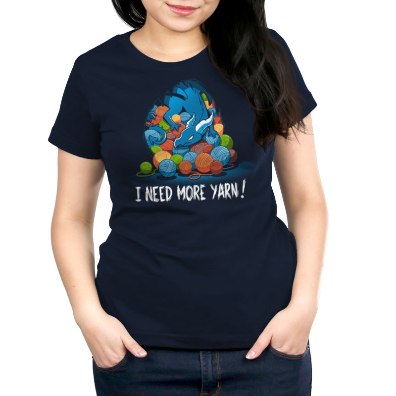 A woman wearing a TeeTurtle T-shirt that says "I need your help, Yarn Hoarder.