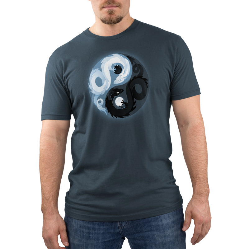 A man wearing a denim blue TeeTurtle t-shirt featuring the Yin and Yang Dragons.
