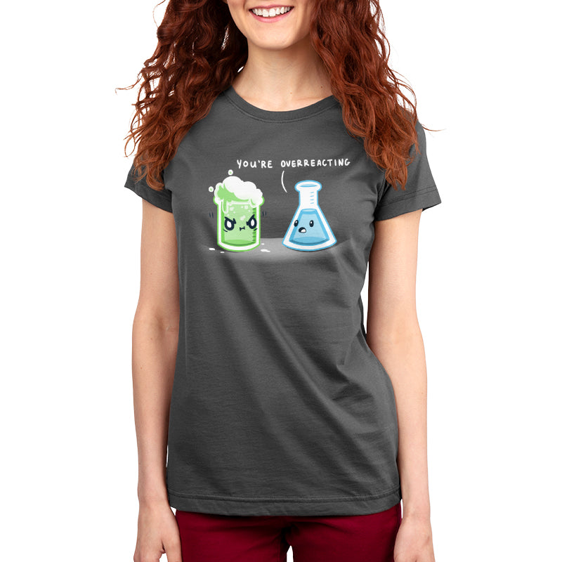 A women's t-shirt featuring a woman and a science beaker, called "You're Overreacting" by TeeTurtle.