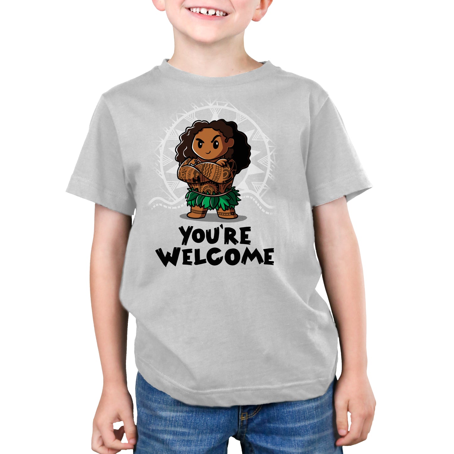 A boy wearing a Disney T-shirt inspired by Moana says "You're Welcome.