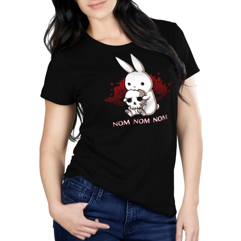 A woman wearing an original and comfortable Adorable Monstrosity black t-shirt with a bunny on it by TeeTurtle.