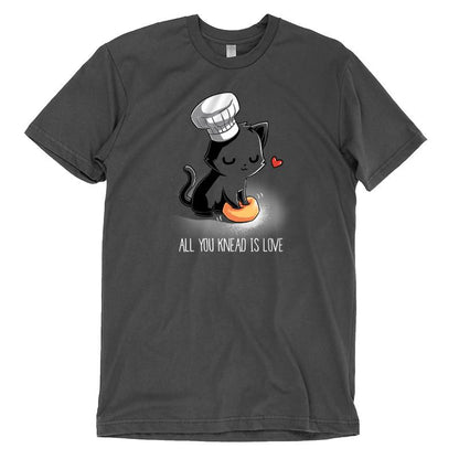 A t-shirt with a cat wearing a chef's hat and saying All You Knead Is Love by TeeTurtle.