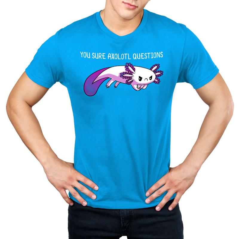 A man wearing a TeeTurtle T-shirt with the word "You Sure Axolotl Questions" explores an axolotl exhibit.