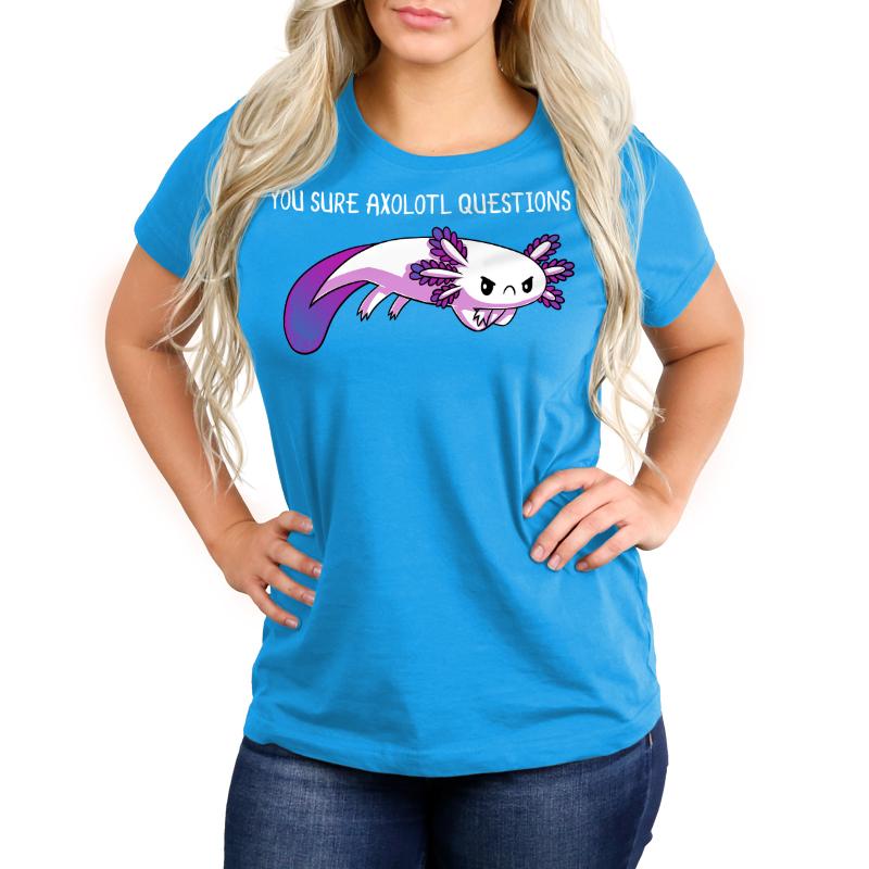 A woman wearing a cobalt blue "You Sure Axolotl Questions" t-shirt by TeeTurtle with a purple eel on it.